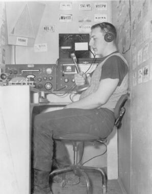 Lowell Rod Demond at the ham rig VE8MC