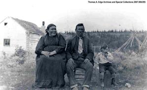 Portrait of an Indian family, one woman, one man and one child, [Alberta].