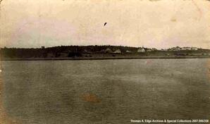 A fort across a body of water, Fort Chippewyan. Note on the back reads: "Chippewyan from the channel".