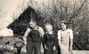 The Karvonen children with their dog, Hollow Lake, Alberta