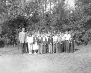 Albert Karvonen and his grade five and six students at Warspite School District No. 3241, Alberta.