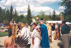 Dominique Abrioux at convocation ceremony outside by the pond, Athabasca, Alberta
