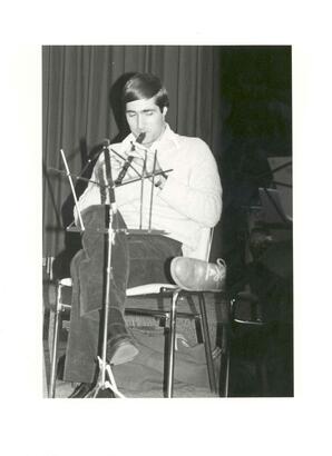 Dominique Abrioux playing a musical instrument, Athabasca, Alberta