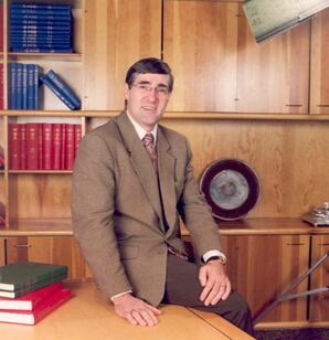 Dominque Abrioux in President's boardroom, Athabasca, Alberta