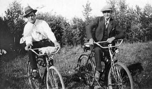 Karl ( Charlie) Deering and person on bicycles