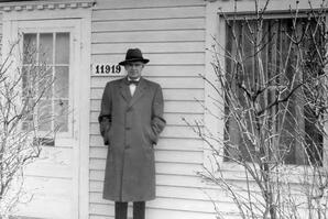 Edgar Vitols in front of first home in Edmonton