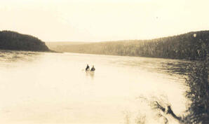 Two Men in a Canoe