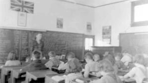 Students and Teacher Inside a School Building