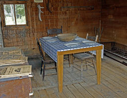 Interior of Board Cabin with Table Setting-02