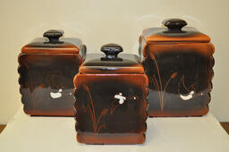 Three Clay Canisters